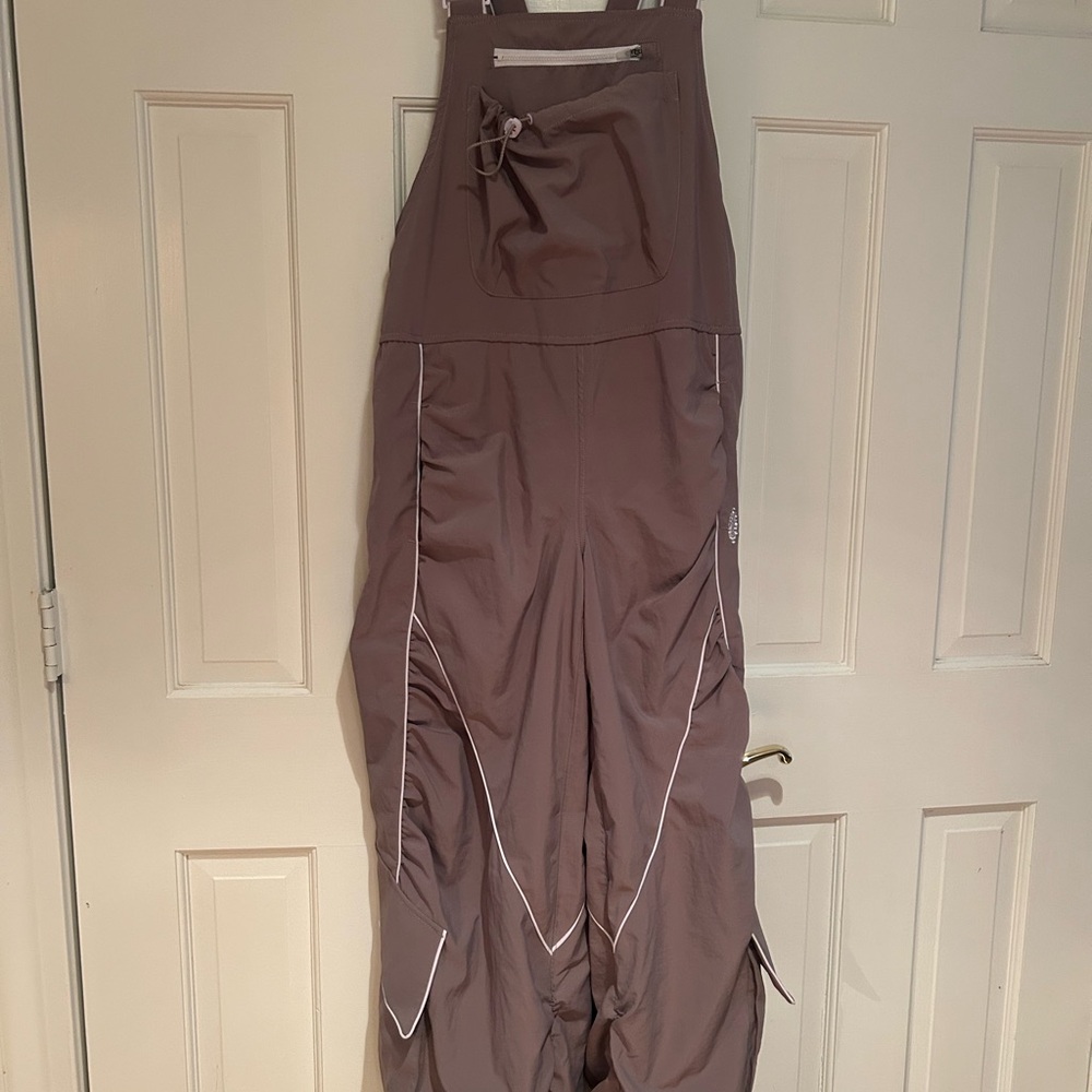 Free People Movement Jumpsuit with Relaxed Fit and Ruched Detailing. NWOT